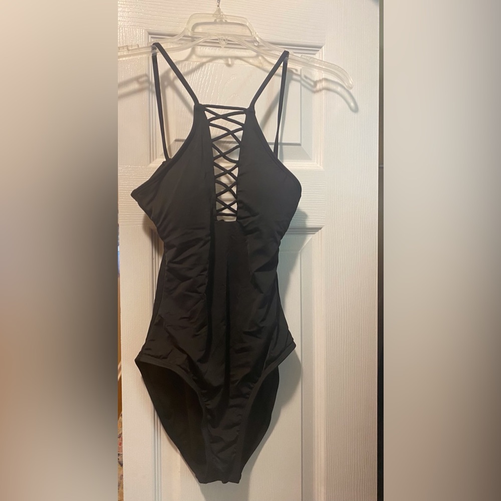 Black one piece swim suit crisscross
